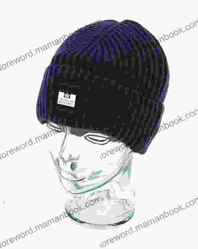 A Man Wearing A Knitted Le Weekend Beanie In A Deep Navy Yarn, Showcasing Its Slouchy Design And Ribbed Texture. Knitting Pattern Le Weekend Hat Beret Beanie And Brooch Corsage