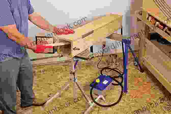 A Person Bending Wood Using A Steam Box DIY Furniture Projects: Handmade Creative Furniture Ideas For Your Home: DIY Furniture Making Guide